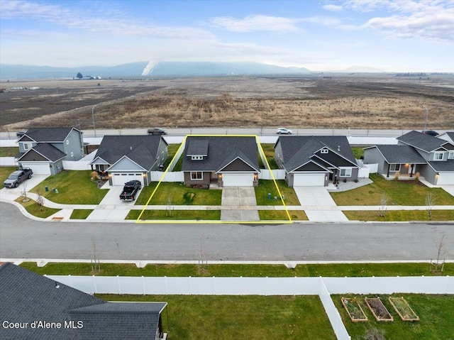 bird's eye view with a mountain view