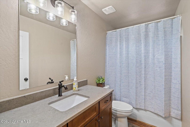 full bathroom with vanity, wood-type flooring, shower / tub combo, and toilet