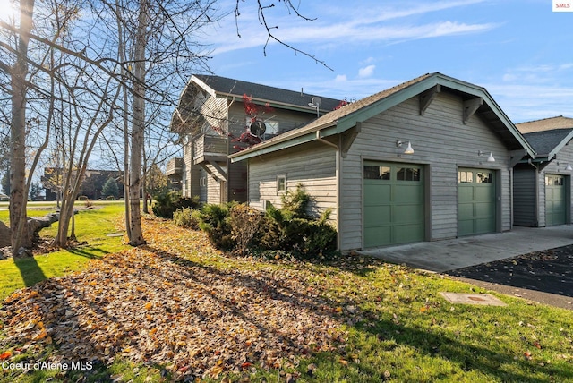 view of property exterior with a garage