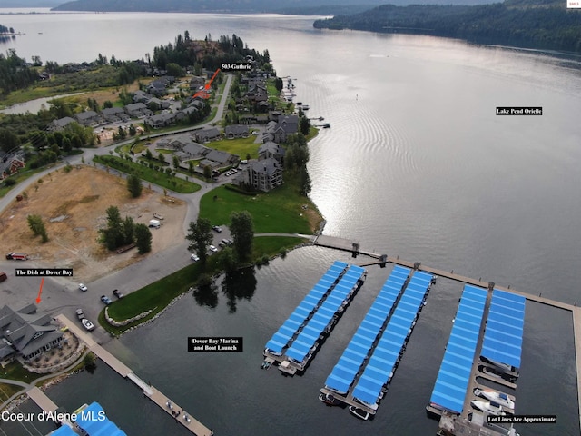 drone / aerial view with a water view