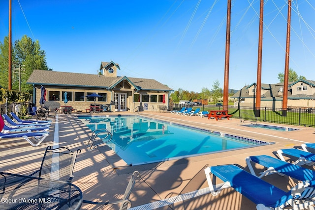 view of pool featuring a patio