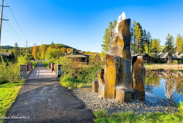 view of property's community with a water view