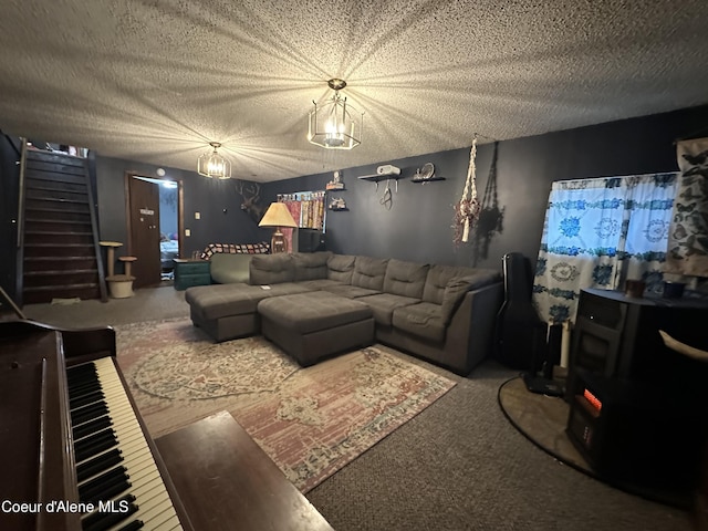 carpeted living room with a wood stove and a textured ceiling