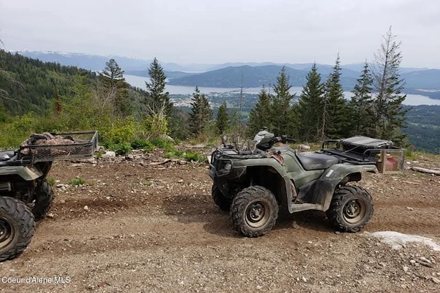 view of parking with a mountain view