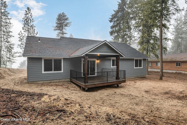 rear view of property with a deck