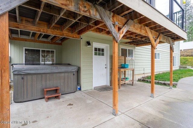 view of patio with a hot tub