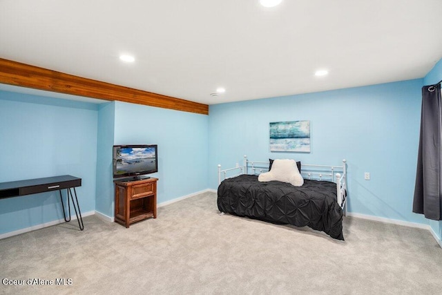 bedroom featuring light carpet