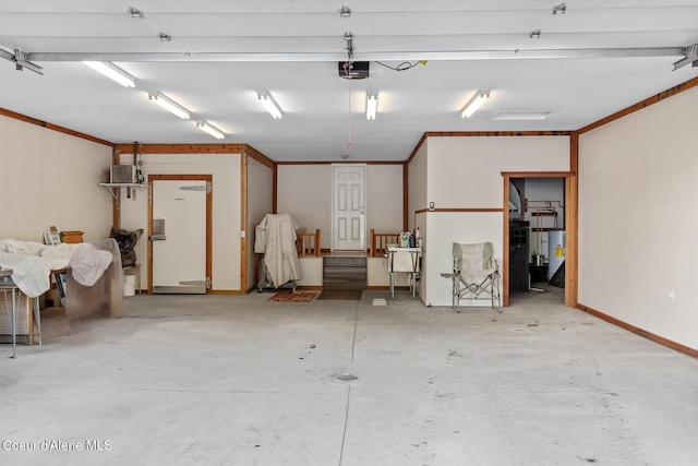 garage featuring a garage door opener and water heater