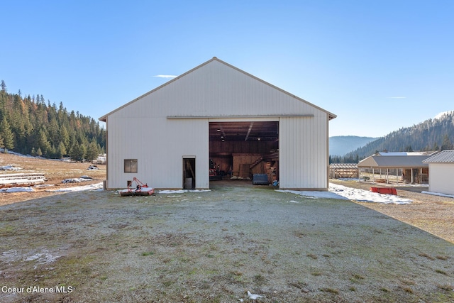 exterior space featuring a mountain view