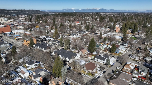 drone / aerial view featuring a mountain view