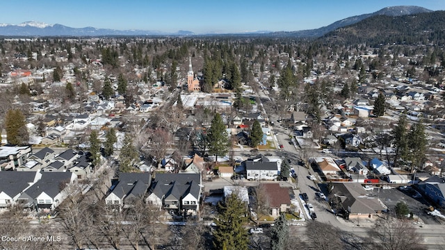 birds eye view of property featuring a mountain view