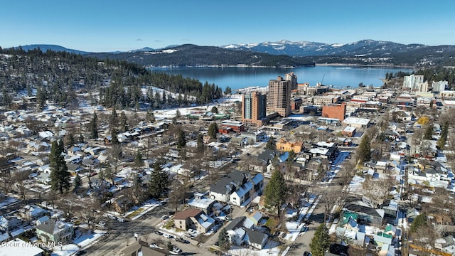 bird's eye view with a water and mountain view