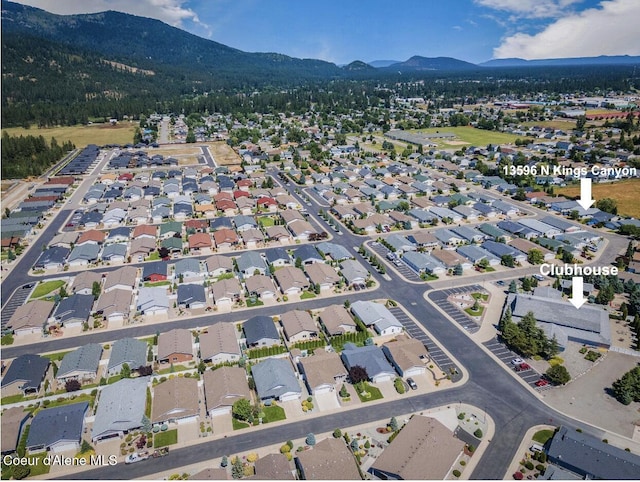 drone / aerial view featuring a mountain view