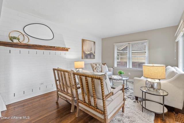 living room with dark hardwood / wood-style flooring