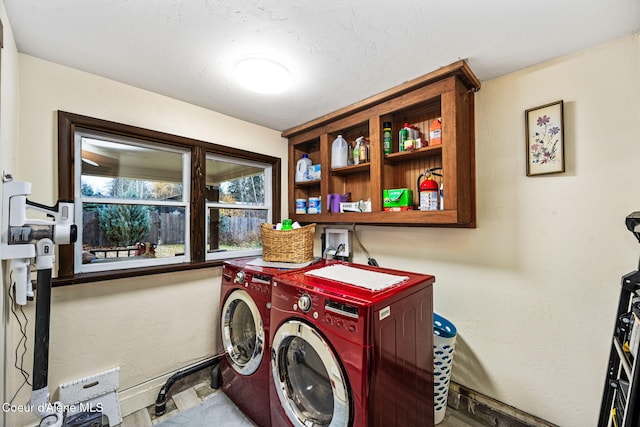 laundry room with washer and clothes dryer