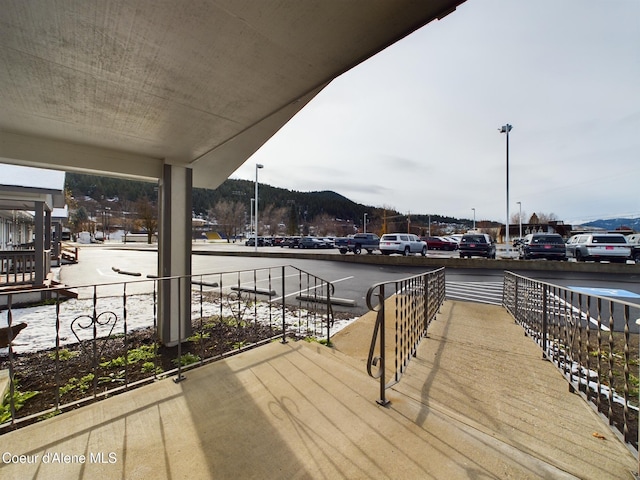 wooden terrace with a mountain view