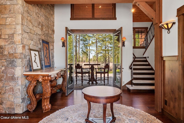6126 S Gozzer Rd, Harrison, ID 83833 - entryway with beamed ceiling, dark hardwood / wood-style floors, and a high ceiling