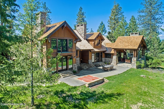6126 S Gozzer Rd, Harrison, ID 83833 - view of front of property featuring a patio area and a front yard