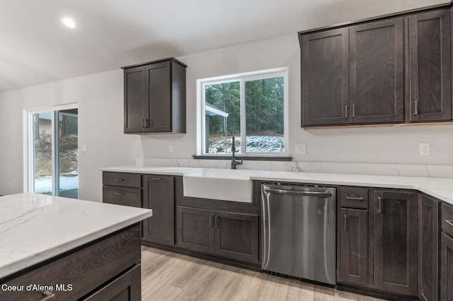 kitchen with dishwasher, light hardwood / wood-style flooring, a healthy amount of sunlight, and sink