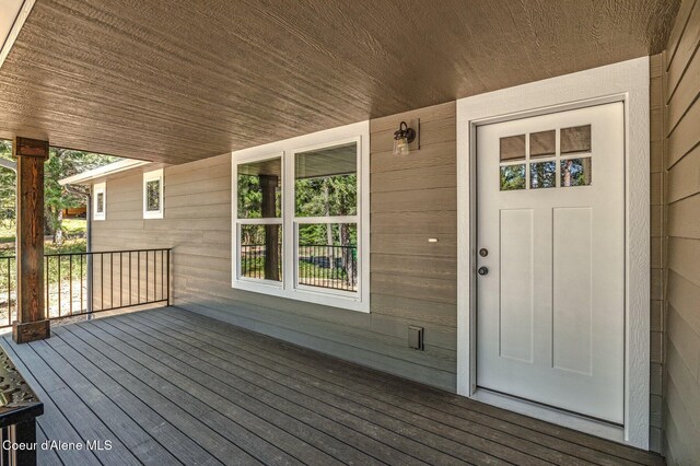 deck featuring covered porch