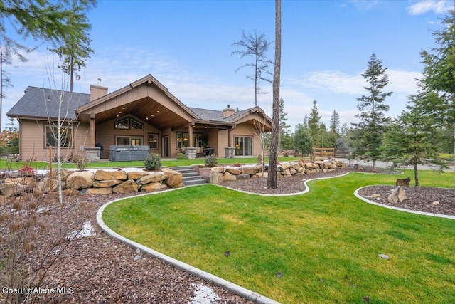 view of front of property with a front lawn