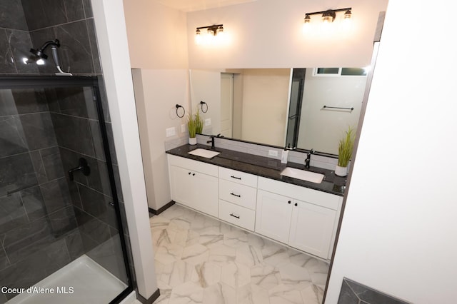 bathroom with vanity and an enclosed shower