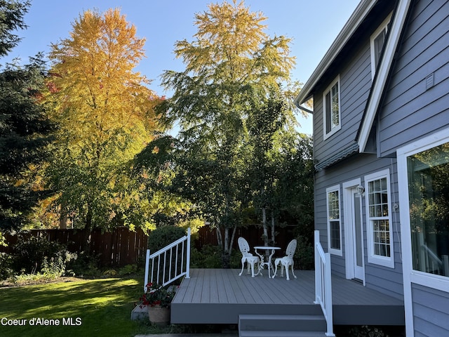 deck featuring a yard