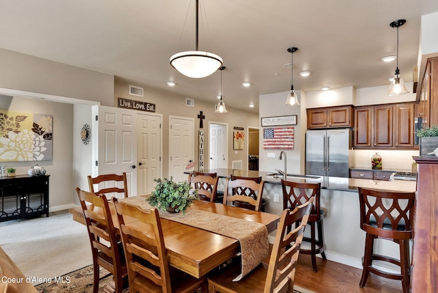 dining area featuring sink