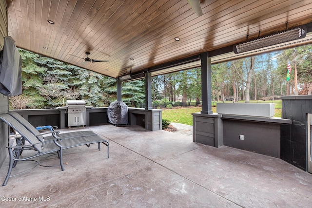 view of patio featuring ceiling fan and area for grilling