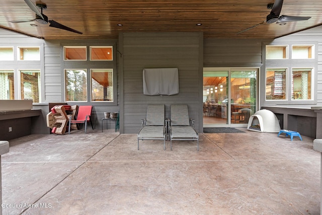 view of patio featuring ceiling fan