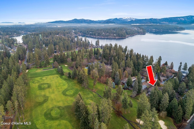 aerial view featuring a water and mountain view