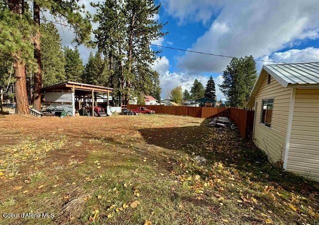 view of yard with a carport