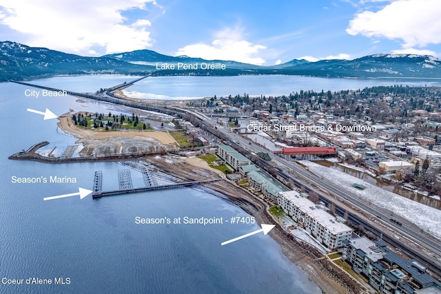 bird's eye view featuring a water and mountain view