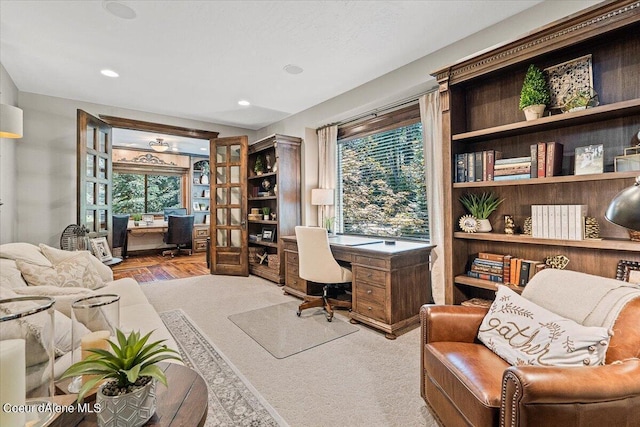 office space with light hardwood / wood-style flooring