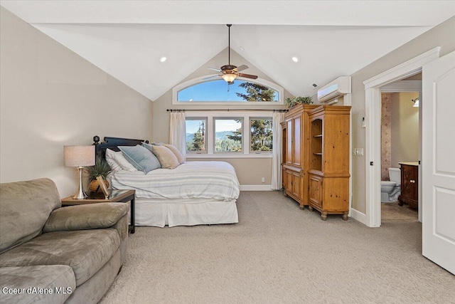 bedroom featuring an AC wall unit, vaulted ceiling, ceiling fan, connected bathroom, and light colored carpet