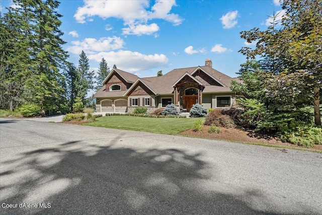 craftsman house with a front yard