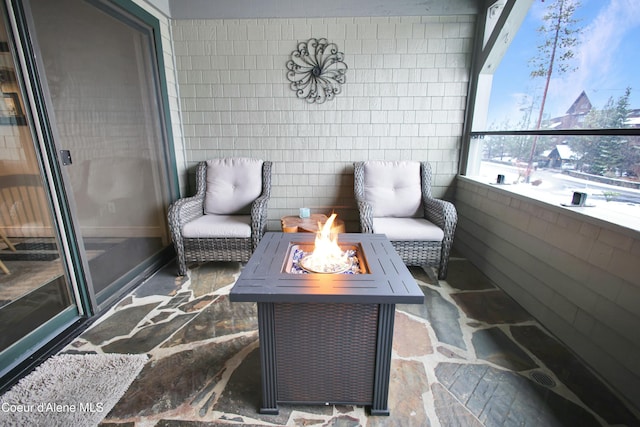 balcony with an outdoor fire pit