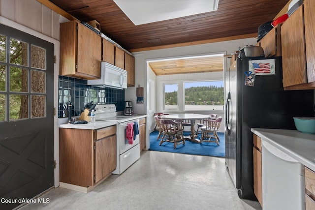 kitchen with decorative backsplash, wooden ceiling, and white appliances