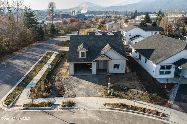 drone / aerial view featuring a mountain view