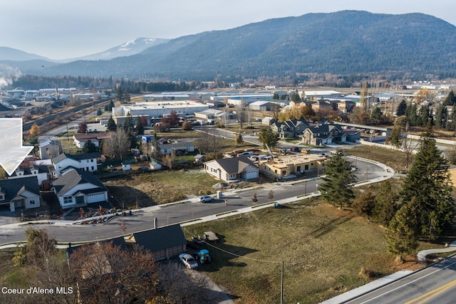 birds eye view of property featuring a mountain view