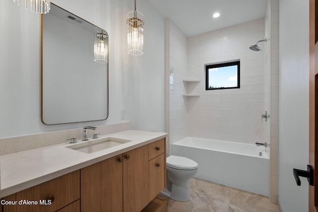 full bathroom with tiled shower / bath combo, vanity, toilet, and a notable chandelier