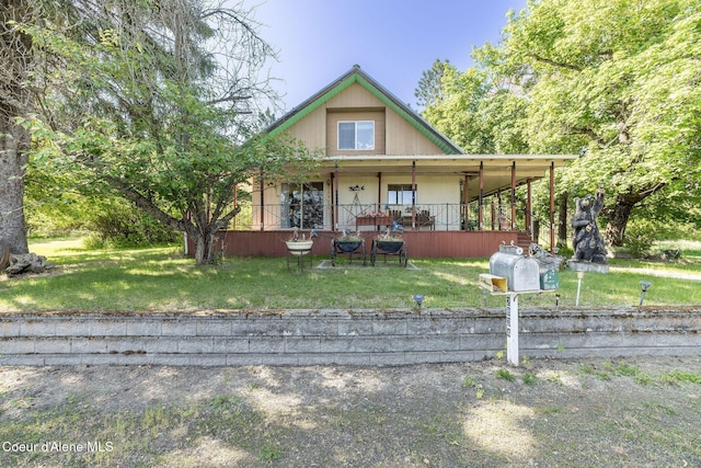 2834 W Conkling Rd, Worley, ID 83876 - view of front of home featuring covered porch and a front lawn