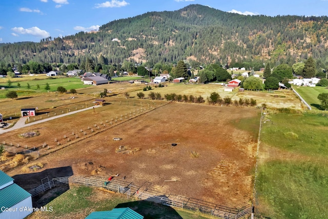 drone / aerial view with a mountain view and a rural view