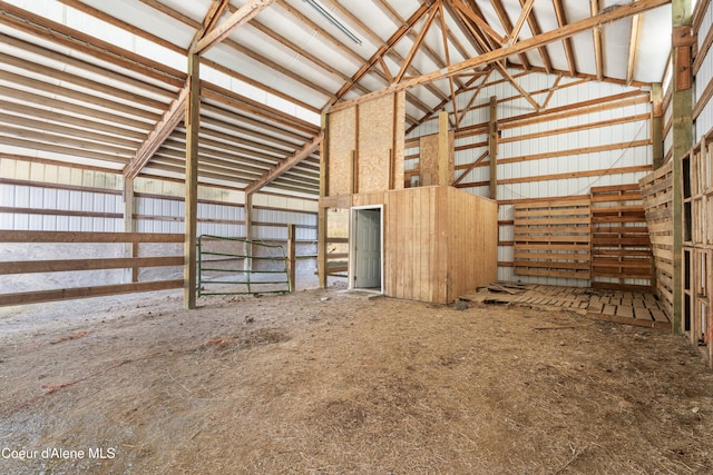 misc room with high vaulted ceiling