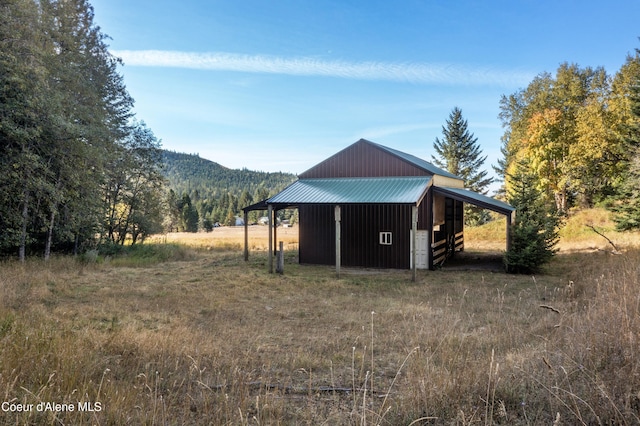 view of outdoor structure with a mountain view