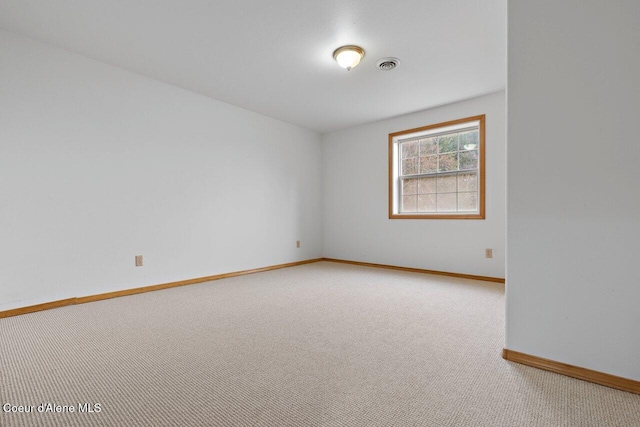 view of carpeted spare room