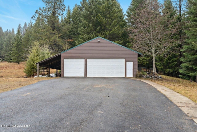 garage with a carport