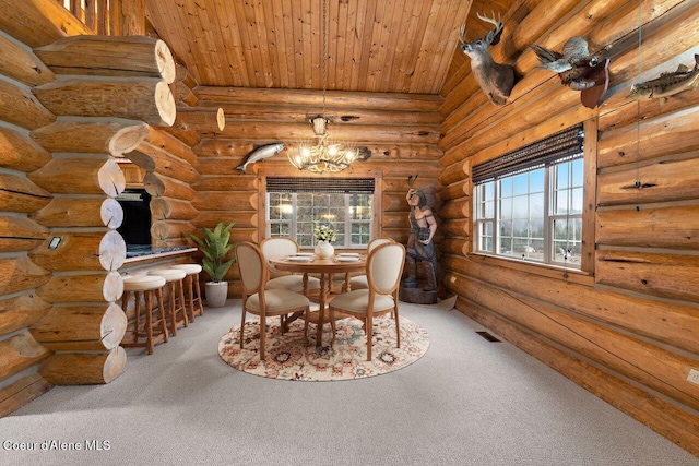 unfurnished dining area featuring rustic walls, a chandelier, carpet floors, and wooden ceiling