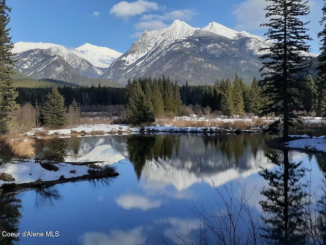 mountain view featuring a water view