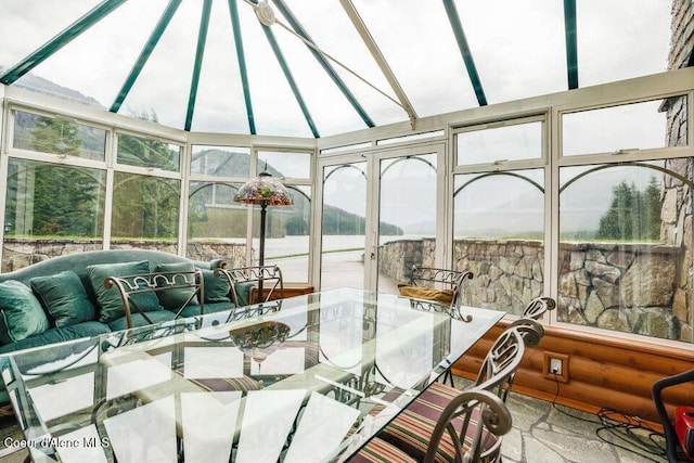 sunroom / solarium featuring a wealth of natural light